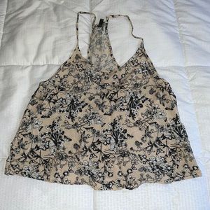 cream colored flower detail halter top